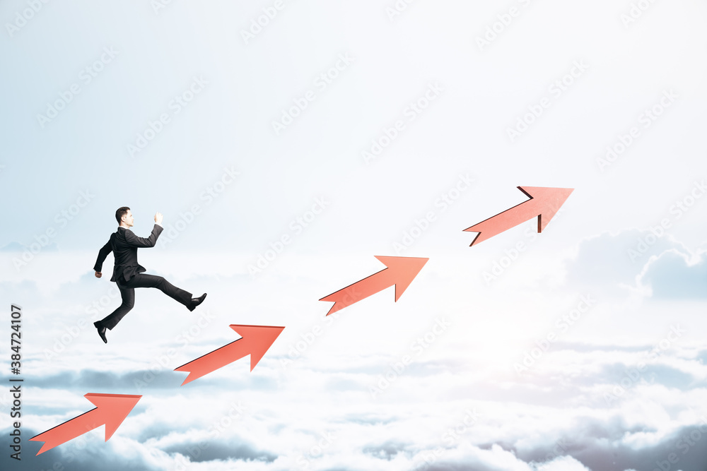Young businessman runing on red arrows o Young businessman runing on red arrows o
