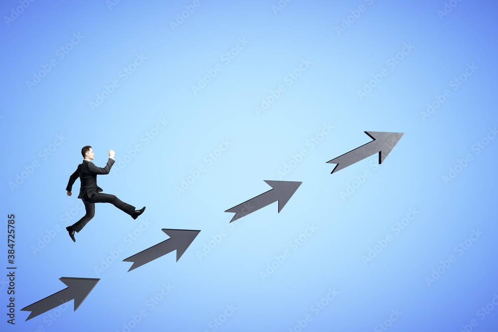 Businessman in suit runing on black arrows Businessman in suit runing on black arrows