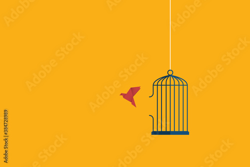 Flying bird and cage. Freedom concept. Emotion of freedom and happiness. Minimalist style.	