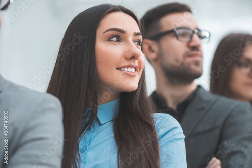 close up. young business woman standing with her colleagues