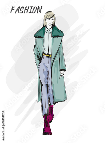 Beautiful young blonde hair woman in autumn coat. Hand drawn fashion girl. Fashion model posing. Sketch. Vector illustration. Fashion woman look. Sketch.