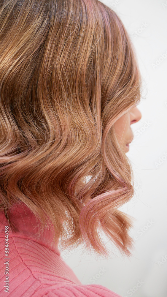 Blond hair after treatment with Curling iron. Blond hair after treatment with Curling iron.