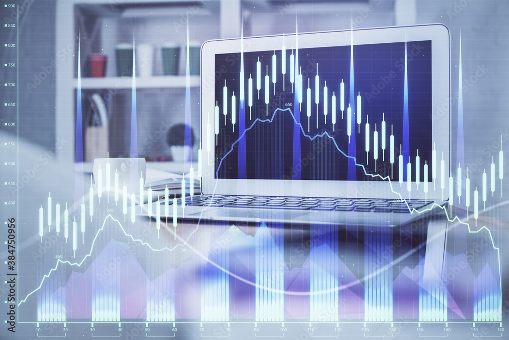 Financial market graph hologram and personal computer on background. Double exposure. Concept of forex.