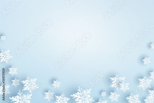Paper snow flakes on winter blue background. Vector flying snowflakes for Christmas greeting card design