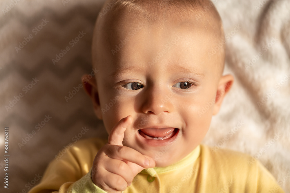 Closeup face baby first teeth, The first two teeth of the baby, Babies happiness, explore the world, joy, childhood, psychology, portrait concepts Closeup face baby first teeth, The first two teeth of the baby, Babies happiness, explore the world, joy, childhood, psychology, portrait concepts