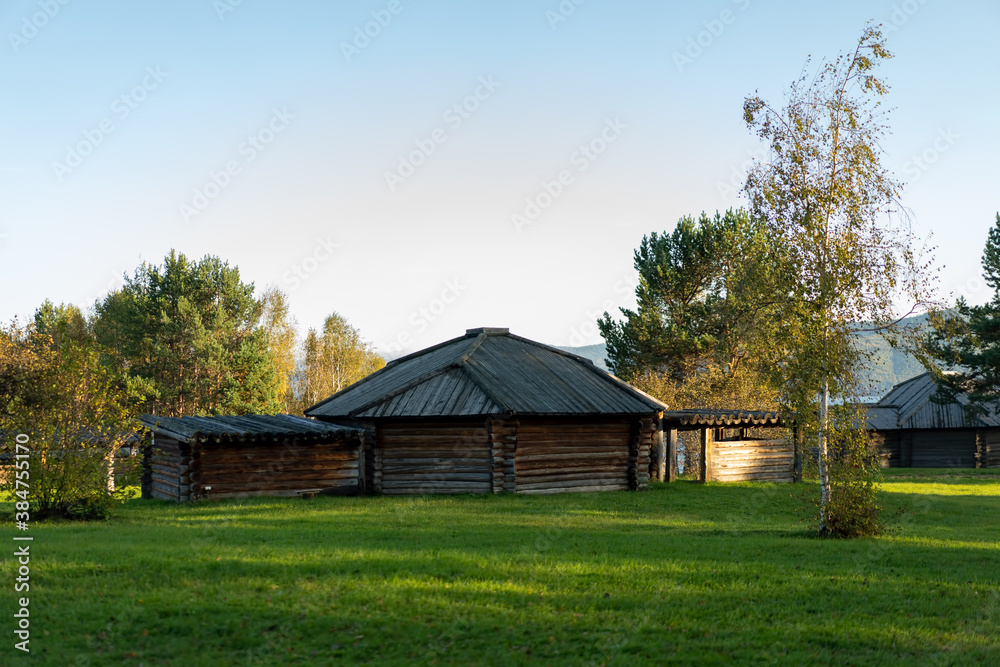 Fototapeta premium Natural landscape with wooden buildings.