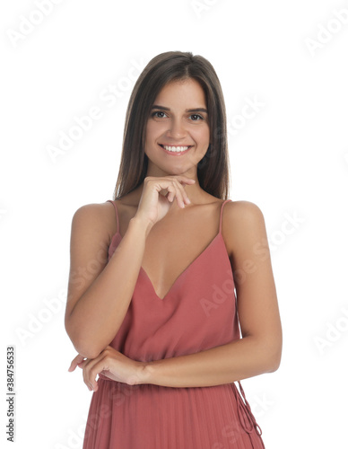 Young woman wearing stylish pale pink dress on white background © New Africa