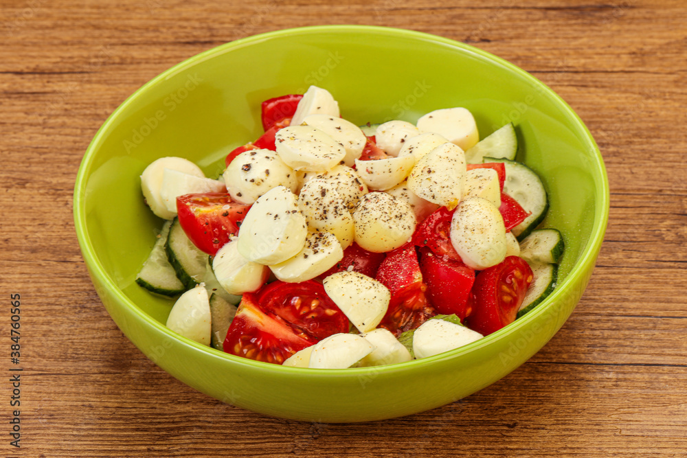 Salad with vegetables and mozzarlla Salad with vegetables and mozzarlla