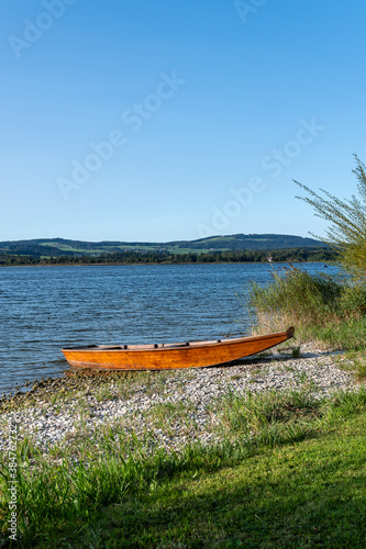 boat at lake wallersee in the county salzburg, Austria photo