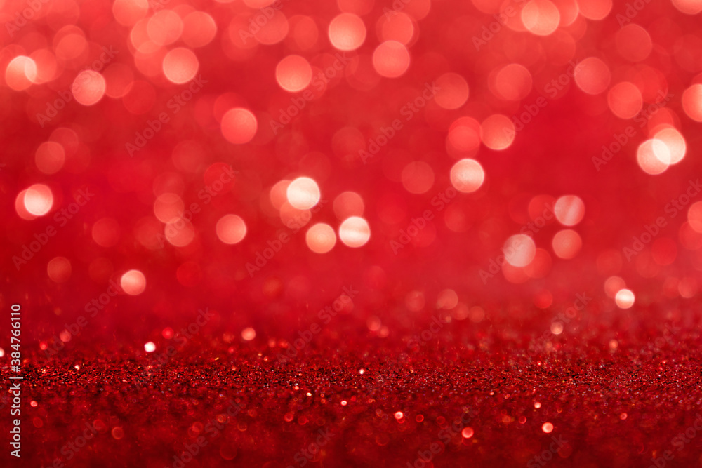 Red abstract background with bokeh defocused lights

