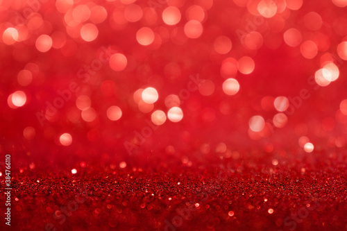 Red abstract background with bokeh defocused lights 