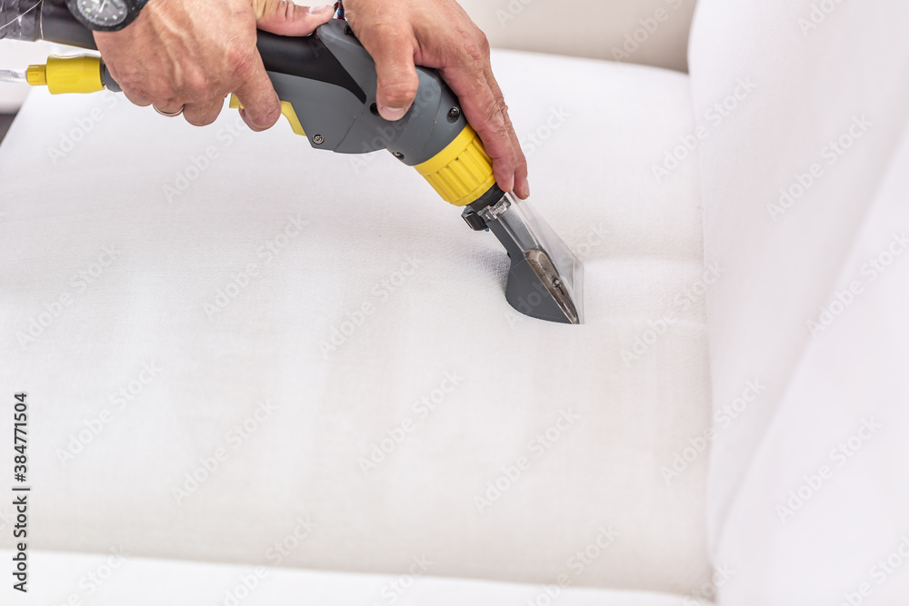 Shampoo cleaning of a white sofa in detail