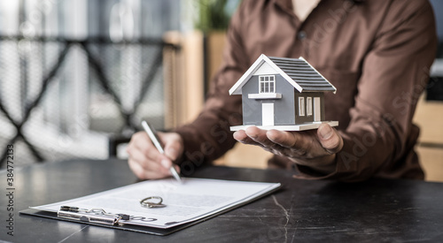 Home sales staff ready to submit a home insurance offer
