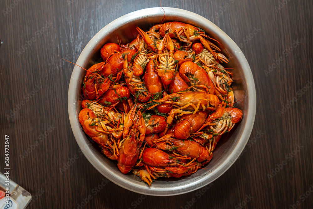 Large bowl of fresh boiled crawfish with dill from above Large bowl of fresh boiled crawfish with dill from above