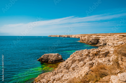 Beautiful sea coast with turquoise water and rocks in Atlesh(Tarkhankut) region, Crimea. Summer seascape, famous travel destination
