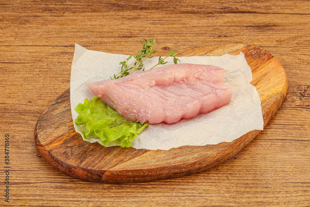 Raw turkey breast steak for cooking Raw turkey breast steak for cooking