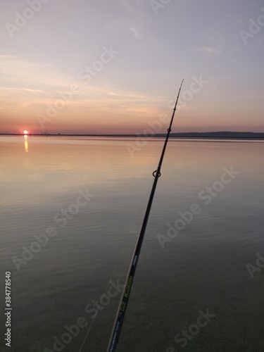 fishing at sunset
