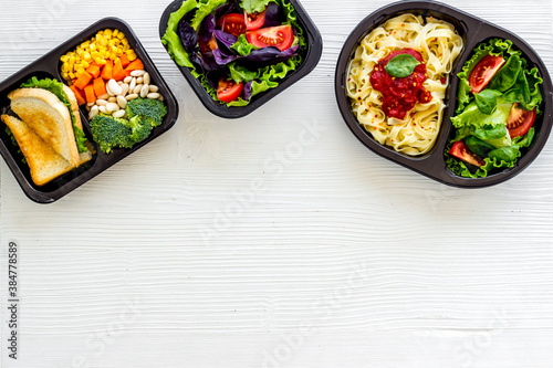 Lunch boxes with meal. Food delivery concept. Overhead view