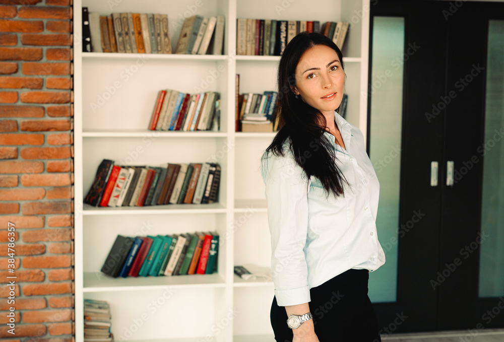 Start up of enterprise, women leader the new company self-confident. Portrait of smiling millennial businesswoman or CEO looking at camera, female boss posing making picture for company photoshoot Start up of enterprise, women leader the new company self-confident. Portrait of smiling millennial businesswoman or CEO looking at camera, female boss posing making picture for company photoshoot