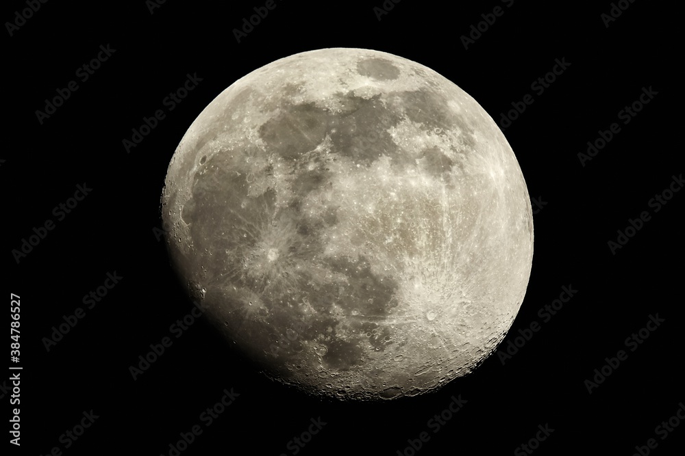 Obraz premium Moon detailed shot in growin almost full, taken at 1600mm focal length, waxing gibbous phase, contrasty details