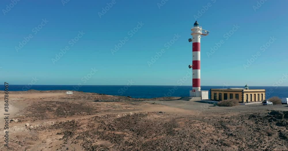 Aerial view. Lighthouse Faro de Rasca on Tenerife, Canary Islands, Spain. Wild Coast of the Atlantic Ocean. Aerial view. Lighthouse Faro de Rasca on Tenerife, Canary Islands, Spain. Wild Coast of the Atlantic Ocean.