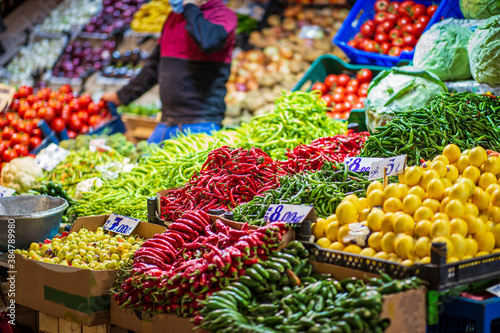 Colorful view of greengrocery counter with several fruits and vegetables