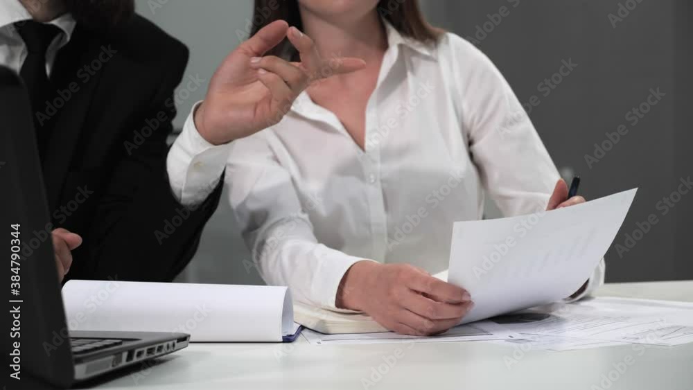 Business people negotiating commercial contract. Hands of creative employee standing and brainstorming strategy plan in happy workshop at creative workplace.