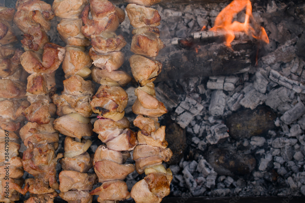Cooking meat barbecue on skewers. Cooking meat barbecue on skewers.