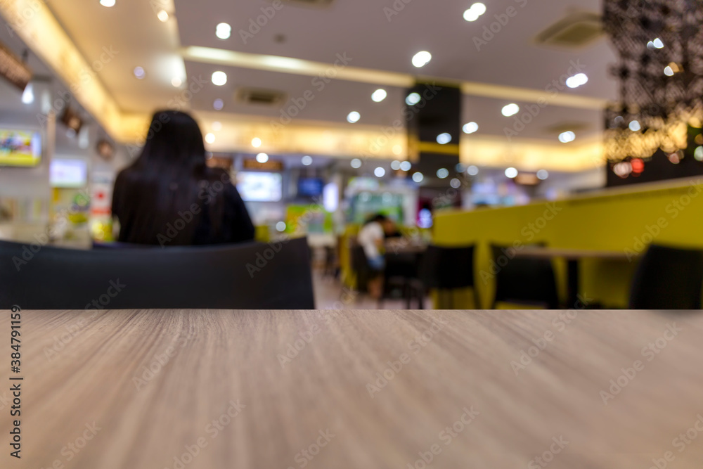 Blur or Defocus food court in shopping mall background. Blur bokeh shopping mall background. Blur Department store for background. Abstract Shopping store with bokeh background.