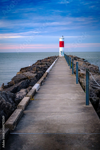 Pier on a Lake with lighthouse graffiti