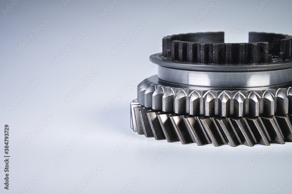 new gear for the gearbox. Mechanical background shiny detail new gear for the gearbox. Mechanical background shiny detail