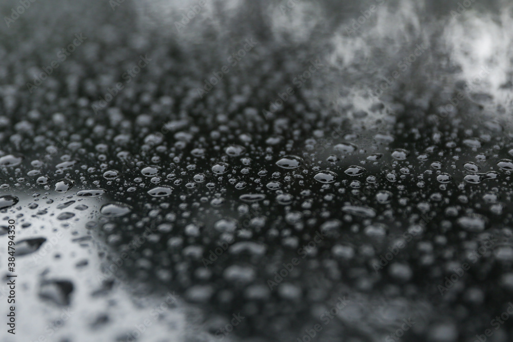 water drops on black background water drops on black background