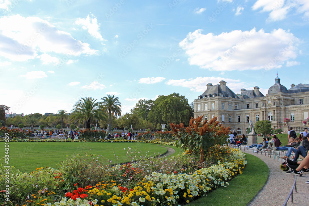 Tourists resting at the Luxembourg Garden, in Paris, France.