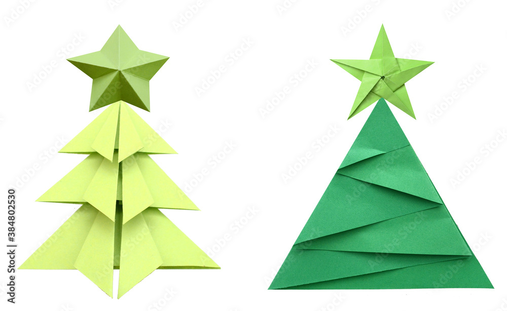 Obraz premium A green origami chirstmas tree with star on white