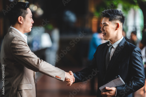 business people hands shake...