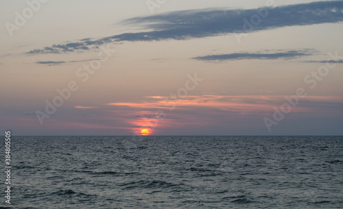 sunset over the baltic sea at curonian spit, kaliningrad region, russia © Vera