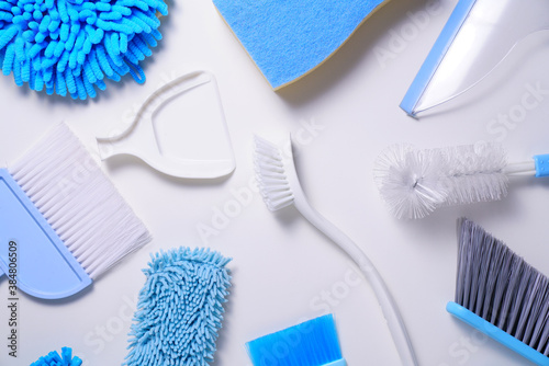 House cleaning blue product on white table background  housekeeping concept