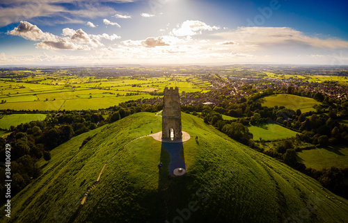 Glastonbury Tor near Glastonbury in the English county of Somerset, topped by the roofless St Michael's Tower, UK photo