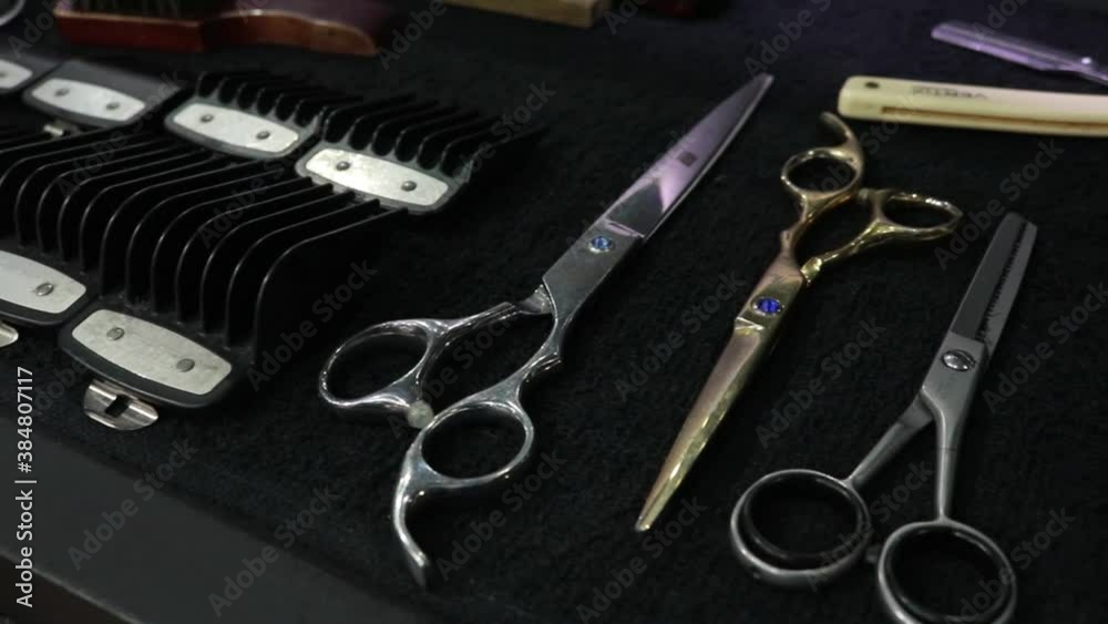 Barber kit tools set up on a desk