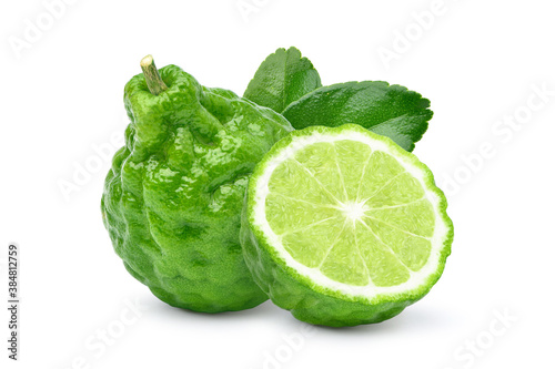 Bergamot fruit with cut in half and leaf isolated on white background.