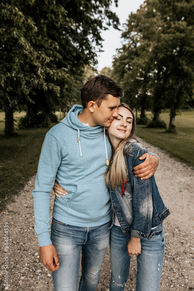 Close up of romantic couple in embrance on nature background Close up of romantic couple in embrance on nature background