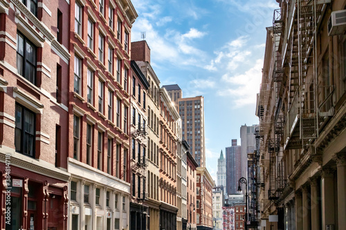 View of the historic buildings along Mercer Street in the SoHo neighborhood of Manhattan, New York City © deberarr
