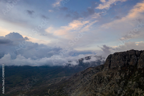 Fototapeta Naklejka Na Ścianę i Meble -  beautiful mountains at sunset against the backdrop of storm clouds
