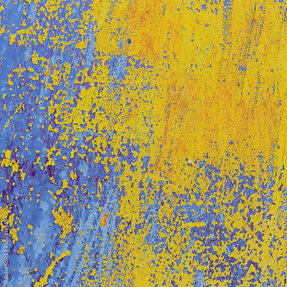 view of a patch of rusty iron with stains of old cracked yellow paint view of a patch of rusty iron with stains of old cracked yellow paint