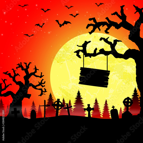 halloween cemetery in front of woodlands with full moon