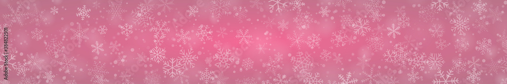 Christmas banner of snowflakes of different shapes, sizes and transparency on pink background Christmas banner of snowflakes of different shapes, sizes and transparency on pink background