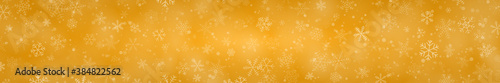 Christmas banner of snowflakes of different shapes, sizes and transparency on yellow background