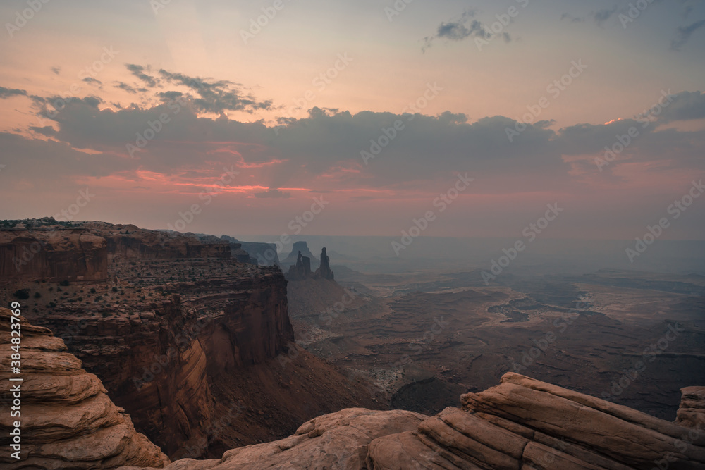 Beautiful sunrise dramatic sky over desert canyon in the Canyonlands National Park. View from above