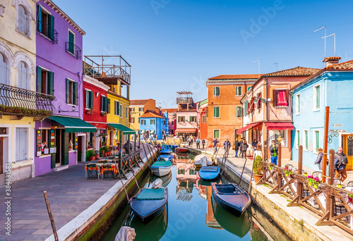 Street and colorful facades on a canal on the island of Burano in Venice in Veneto, Italy © FredP