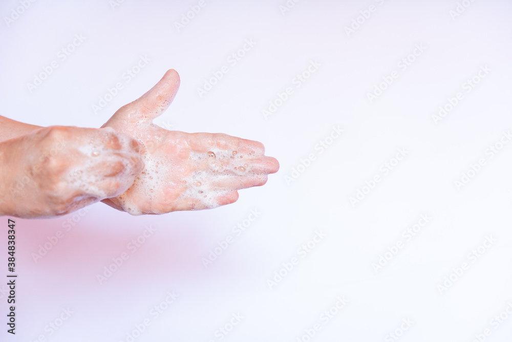 Prevent coronavirus or COVID-19 concept. Handwashing of cleaning hand wash with bubble liquid soap at sink. Prevent coronavirus or COVID-19 concept. Handwashing of cleaning hand wash with bubble liquid soap at sink.